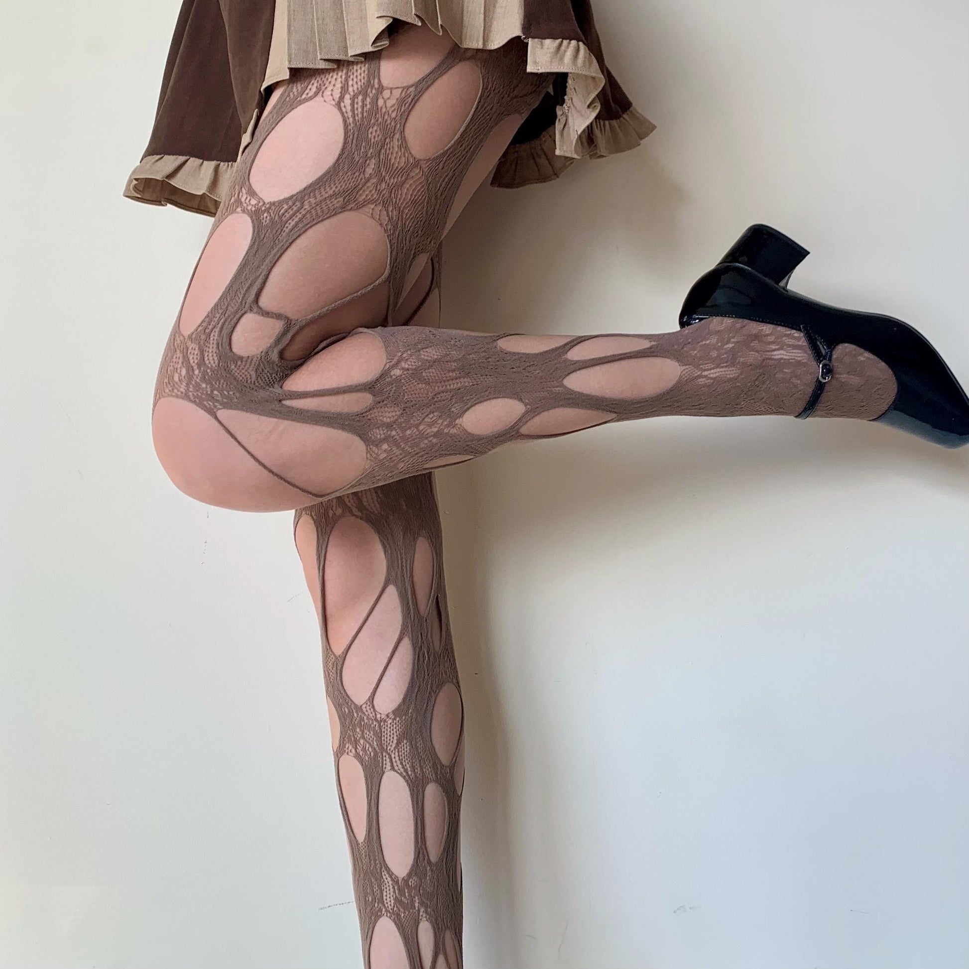 Brown Oval Cut-Out Fishnet Tights